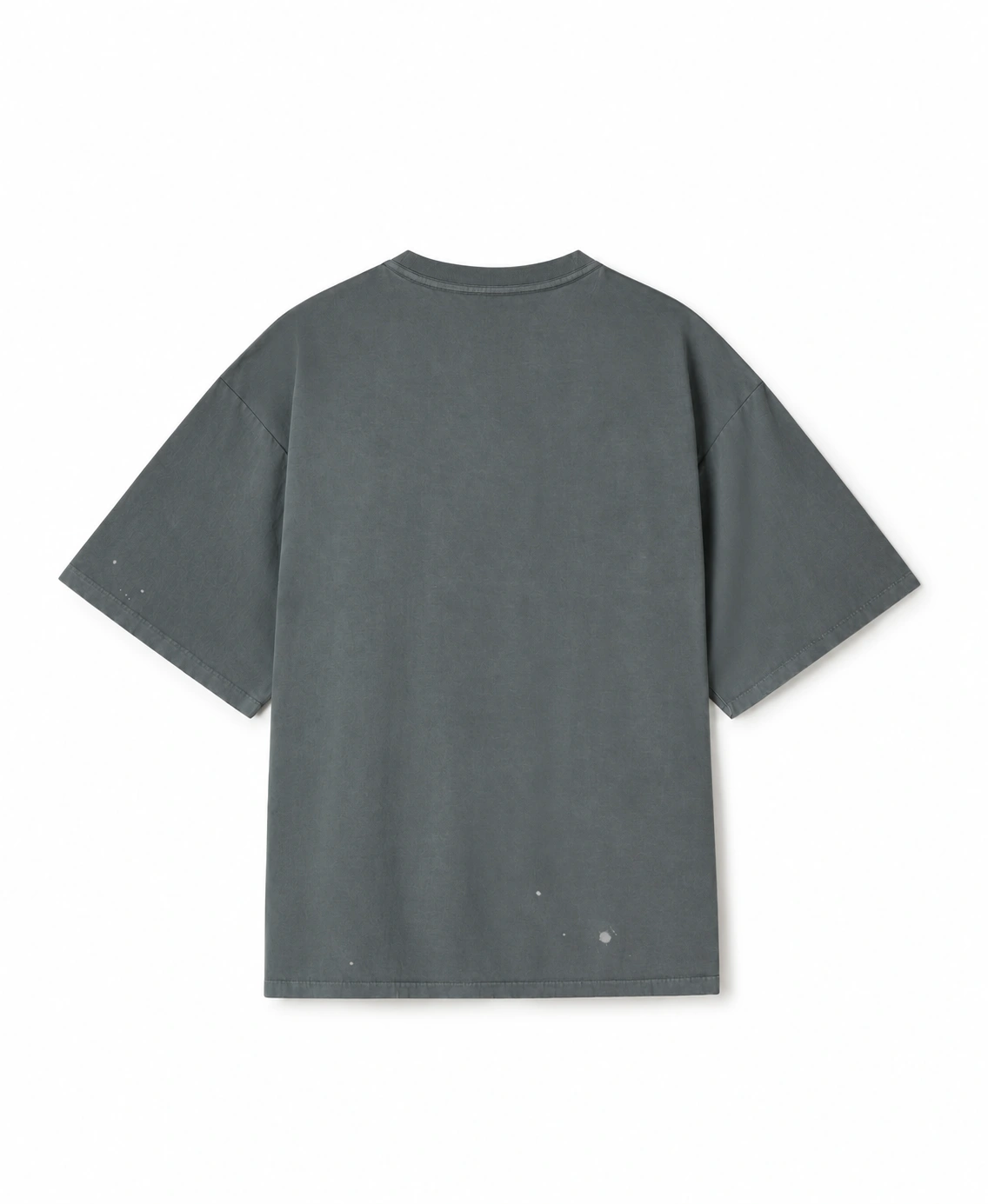 Back of the German-made WERKSTATT work shirt showing its relaxed dropped-shoulder construction and pigment-washed cotton surface